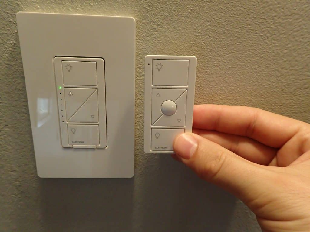 lutron pico remote with favorite button next to dimmer switch